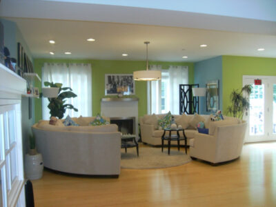 Blue and green Livingroom with white custom furniture